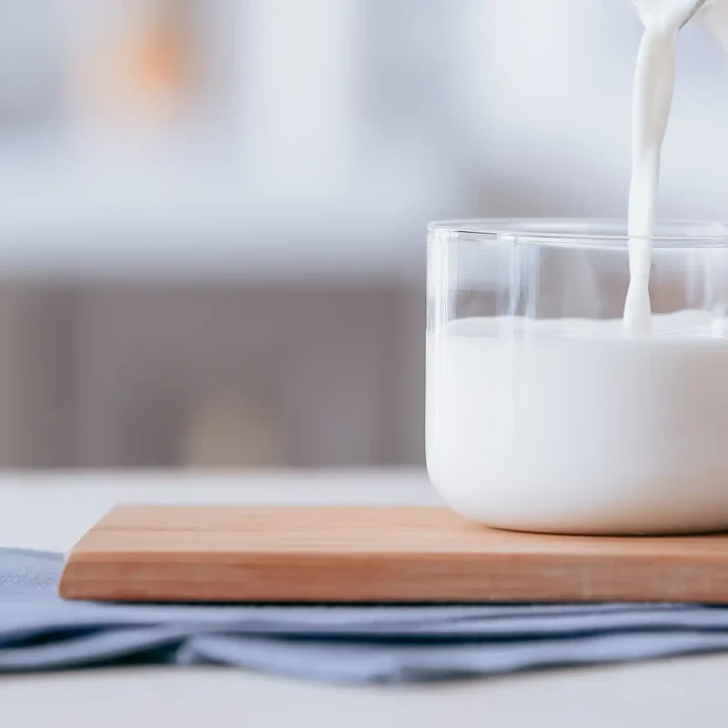 Image of milk being poured in a glass