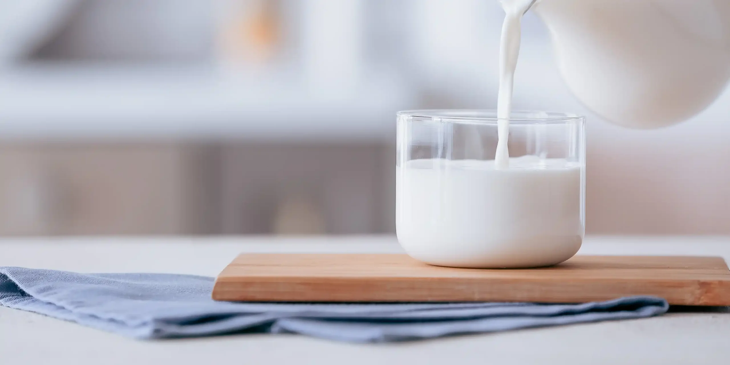 Image of milk being poured in a glass